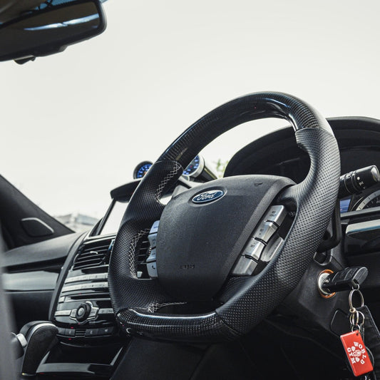 In car view of carbon fibre steering wheel for Ford Falcon FG and FGX